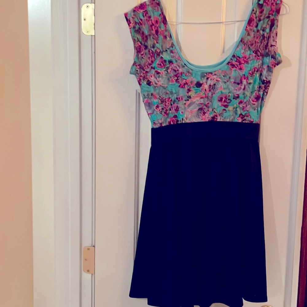 Later, size L, green lace with red flowers, black bottom.